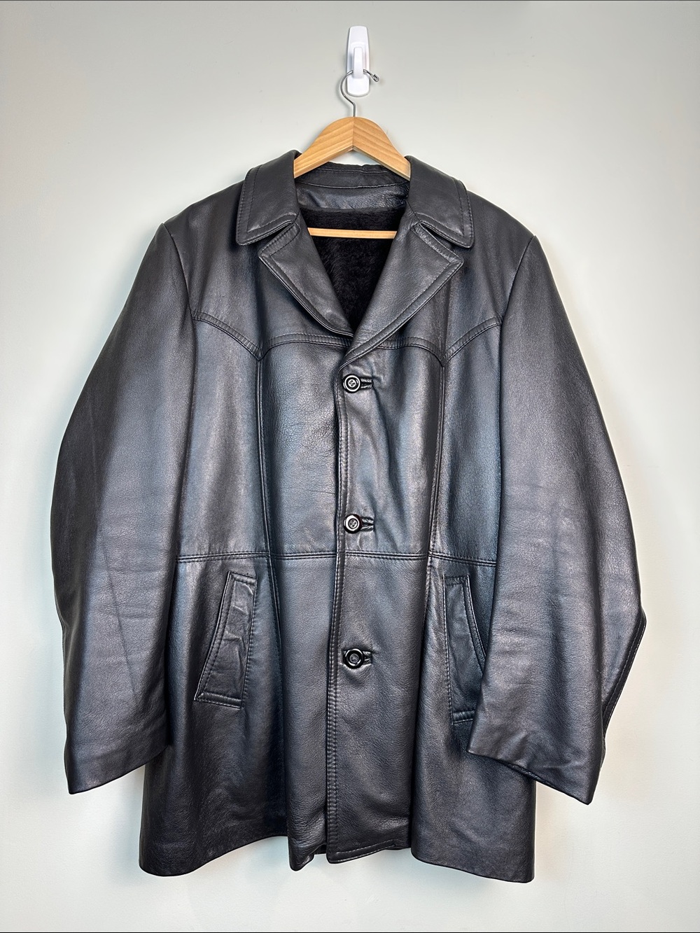 10. Vintage black leather coat with zip out liner